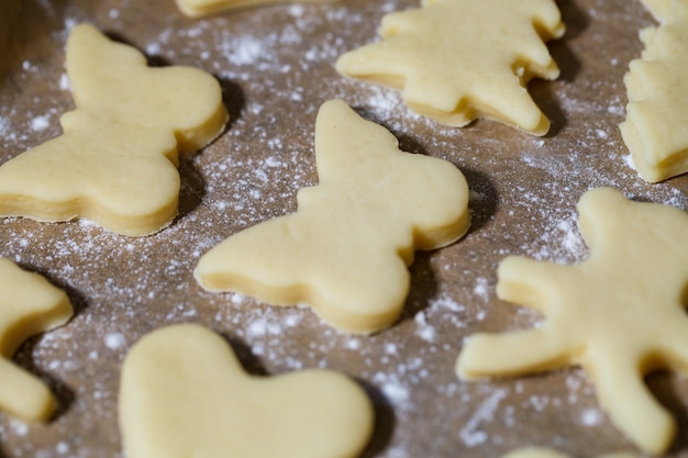 Cooking homemade delicious cookies of different figures from the dough