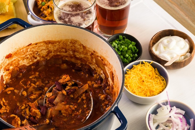 Cooking homemade turkey chili for dinner.