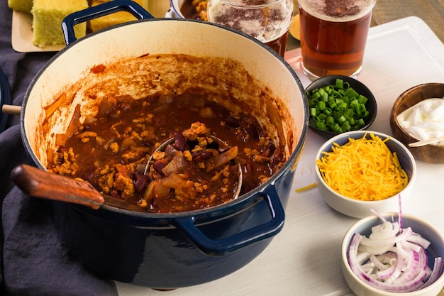 Cooking homemade turkey chili for dinner.