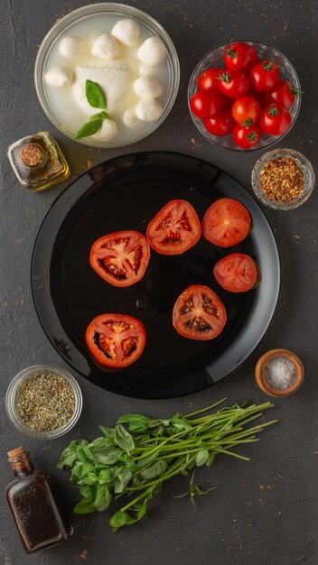 Cooking and ingredients for caprese salad