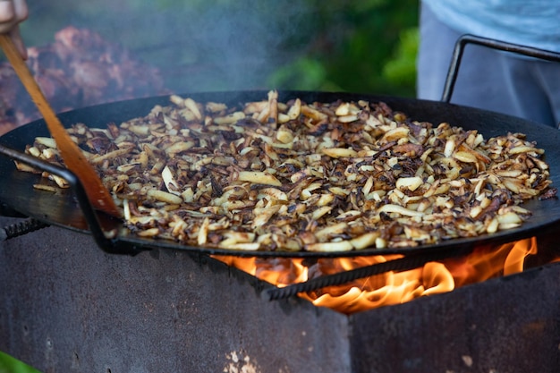 Cooking meat at bbq fire close up