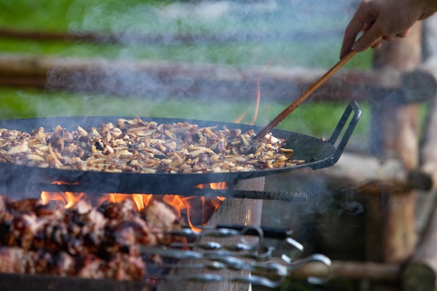 Cooking meat at bbq fire close up