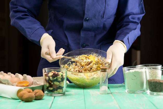 Cooking oatmeal cookies with nuts and candied fruit sweet nutritious dessert