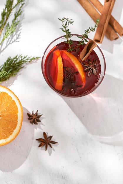 Cooking oranges in red wine with spices