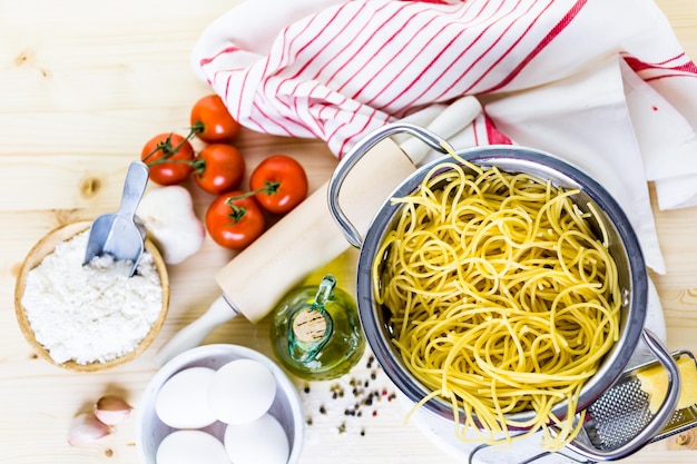 Cooking organic spaghetty for dinner.