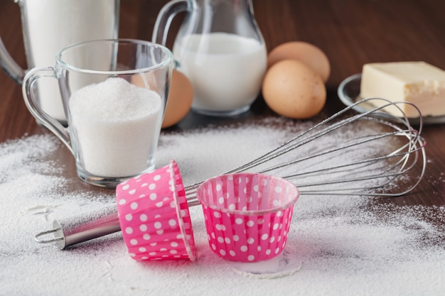 Cooking process. Dry ingredients mix for sponge cake, buns, cupcakes or muffin. Preparation stage. Baking and cooking concept, ingredients and utensils.