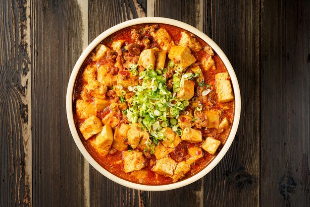 the cooking process of special chinese food roasted tofu with mushroom meat sauce