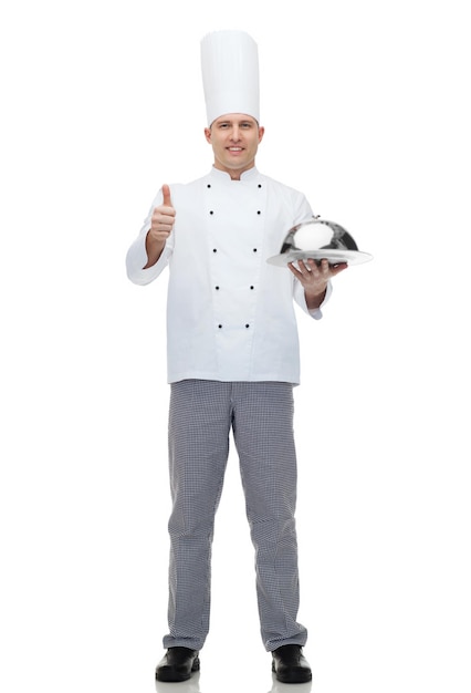 cooking, profession, gesture and people concept - happy male chef cook holding cloche and showing thumbs up