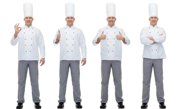 料理、職業、身振り、人々のコンセプト – 幸せな男性シェフがOKを出し、手のサインを親指で示す