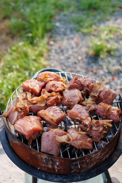 Photo cooking shashlik on a barbecue