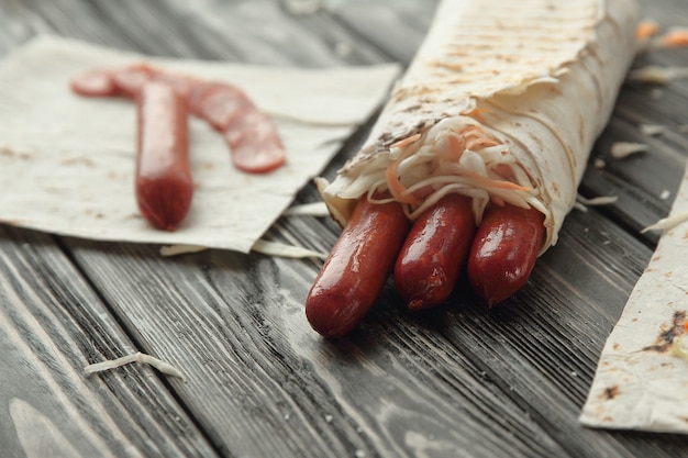 Cooking Shawarma with sausage