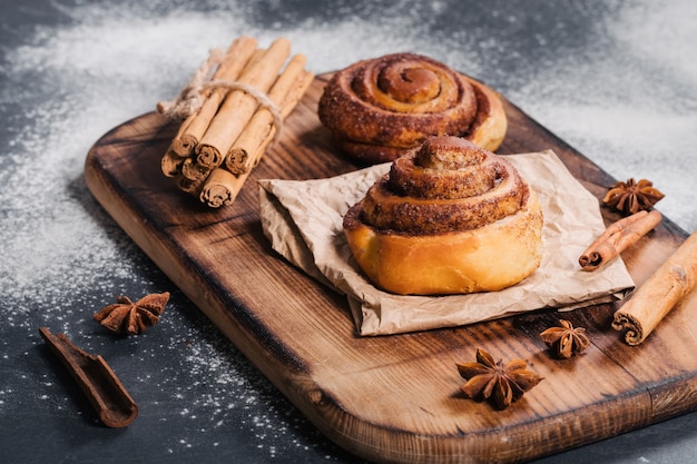 Cooking tasty homemade buns with cinnamon