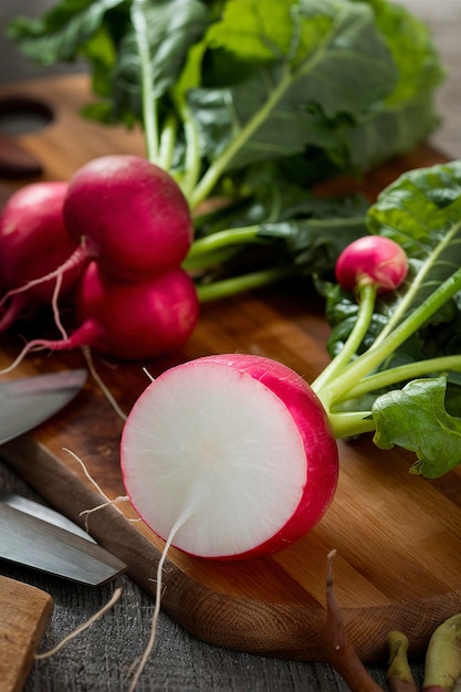 Cooking with radishes fresh radish with leaves on a cutting board