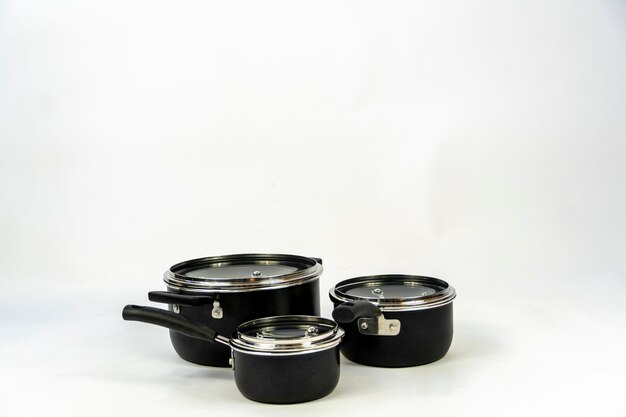 Cookware set steel dinner set isolated on white background black metal cookware set