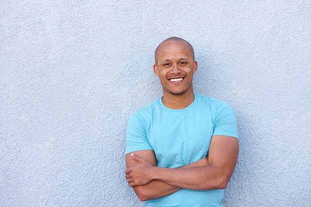 Cool african american man smiling with arms crossed