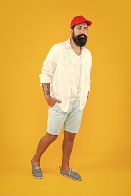 Cool casual man in studio full length cool casual man on background photo of cool casual man with moustache cool casual man isolated on yellow