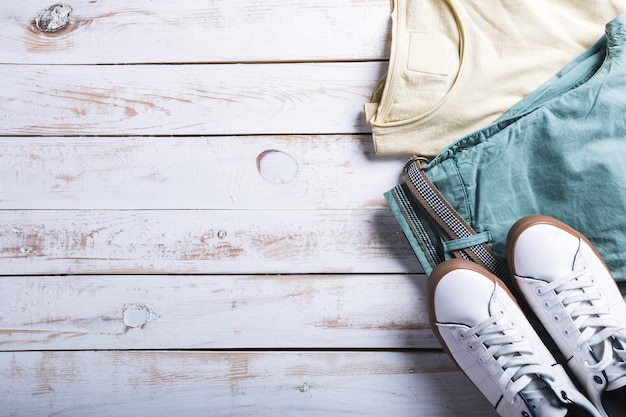 Cool fashion casual men outfit on wooden table