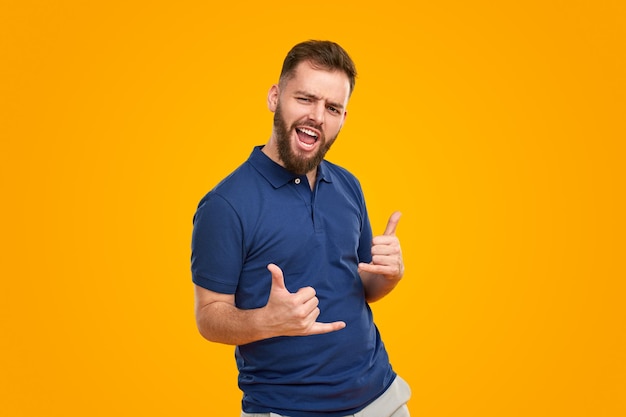 Cool man showing shaka gesture