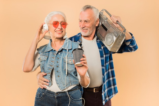 Cool senior couple with ghetto blaster