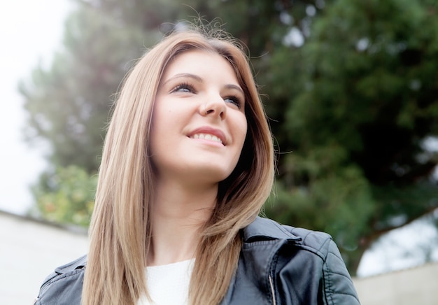 Cool young woman with black jacket