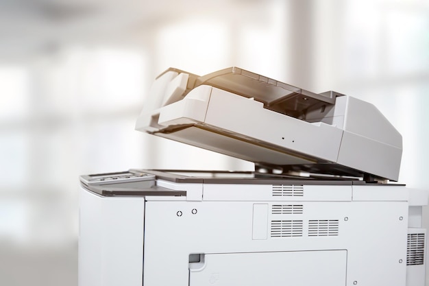 Copier printer Close up the photocopier or photocopy machine office equipment workplace for scanner or scanning document and printing or copy paper duplicate and Xerox