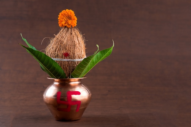 copper kalash with coconut and mango leaf