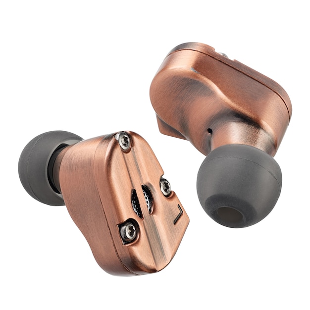 Copper metallic hybrid dynamic driver balanced armature earbuds isolated on white background