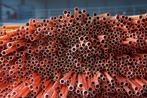 Copper pipes in factory industrial background