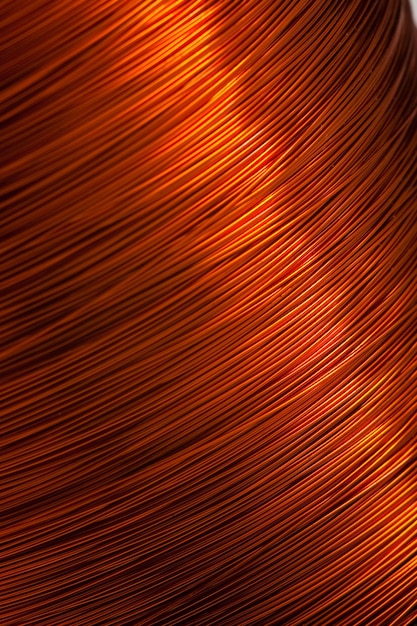 Copper wire for electronics closeup with a focus on the center and blurred edges of the right and left Designed for the production of electronic components in the electrical industry