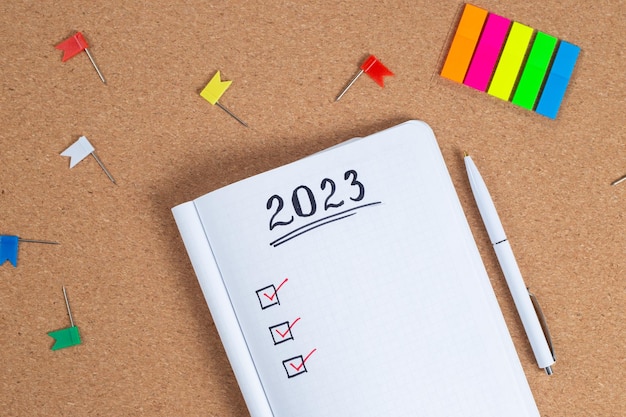 Copy space for 2023 Goals in notebook plan listing of new year goals