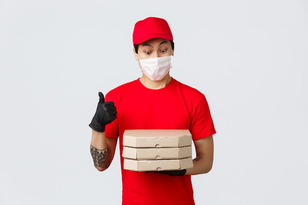 Copy-space delivery man with pizza boxes
