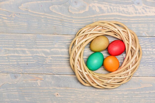 Copy space Healthy and happy holiday Egg hunt Spring holiday Holiday celebration preparation painted eggs in nest Happy easter Enjoying spring holiday