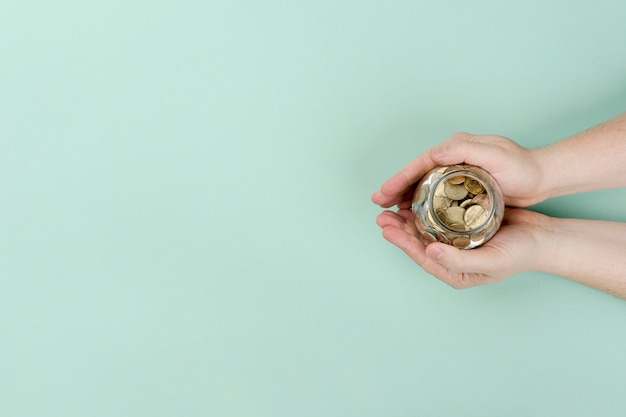 Photo copy-space jar with coins