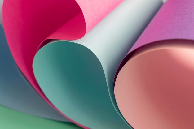 Copy space layers of rolled colored paper