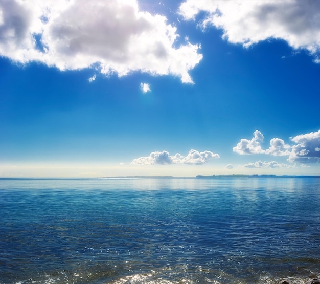 Copy space at sea with cloudy sky background above the horizon Calm ocean waters at the beach of Torrey Pines San Diego California Majestic and peaceful scenic landscape for a relaxing getaway