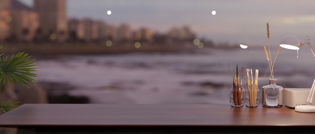 Copy space on a tabletop against a large window with a beautiful sunset coast in the evening