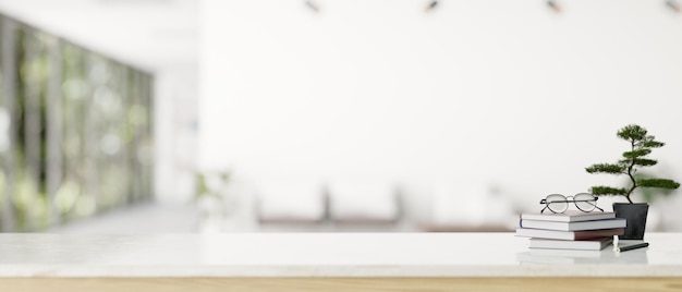 Copy space on a white tabletop with a blurred modern white office corridor in the background