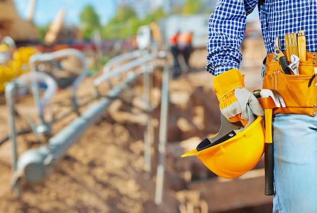 Copycpace image of close up worker holding hellmet