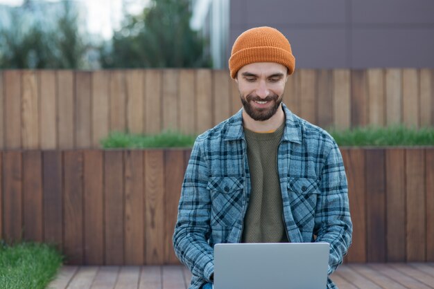 copywriter using laptop computer typing edit something sitting