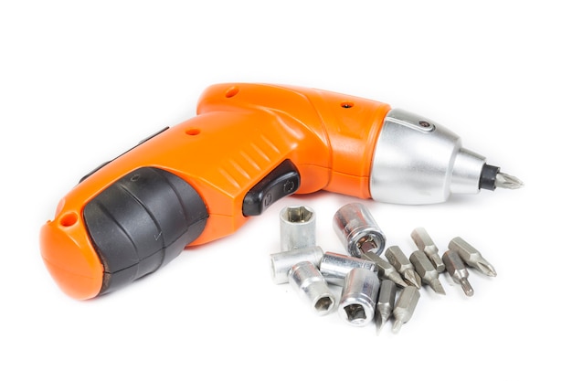 Cordless Drill with different tips on white background