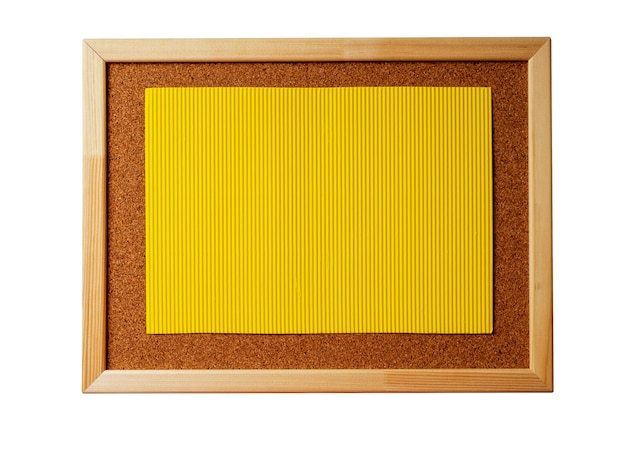 Cork note board with wooden frame with blank yellow cardboard sheet isolated on white background