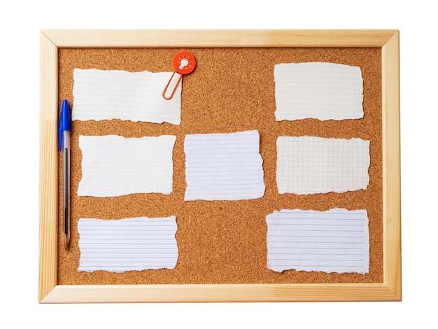 Cork note board with wooden frame with various blank torn note
sheets