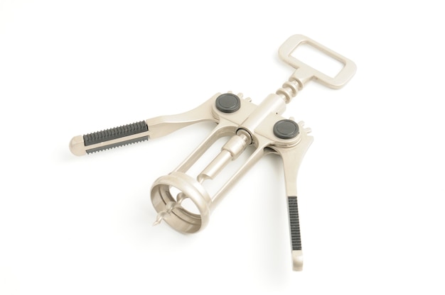 Corkscrew for opening wine bottles on isolated white