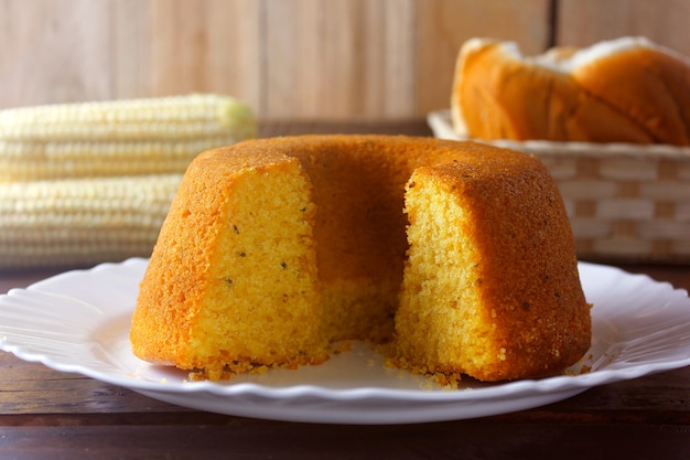 Corn cake sliced on white plate