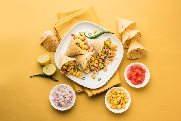 Corn chat / chaat in papad cone, popular indian starter menu