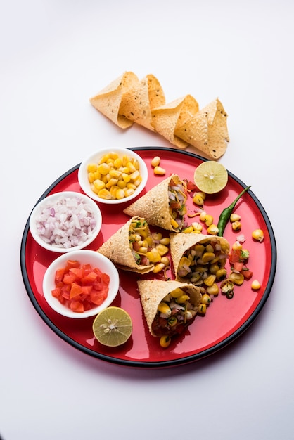 Corn chat / chaat in papad cone, popular indian starter menu