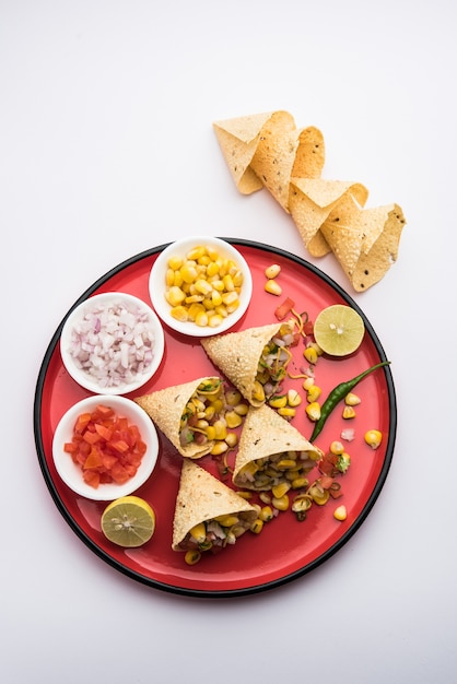 Corn chat / chaat in papad cone, popular indian starter menu