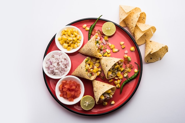 Corn chat / chaat in papad cone, popular indian starter menu