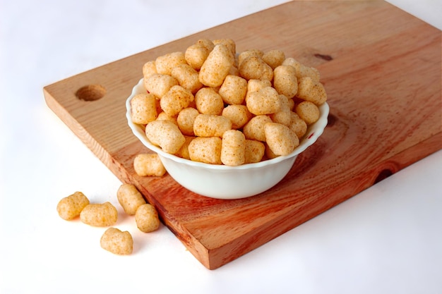 Corn Cheese balls bowl on white background