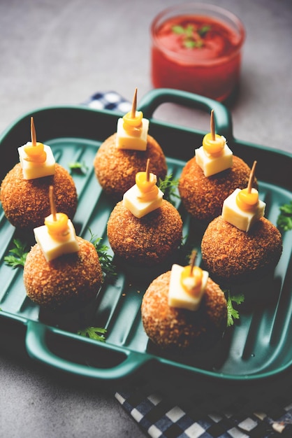 Corn Cheese balls with dip popular party snack from India